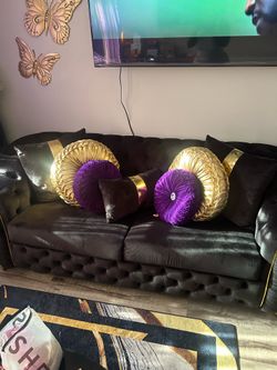 Black and gold sofa and Love fairly knew no one ever sits. I’m moving and going for a new look.
