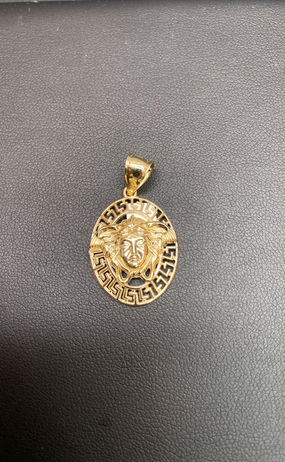 10k real solid gold Versace pendant.