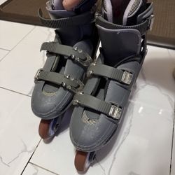  Title: Adjustable Inline Skates - Size 6-9 (Gray)  Description: Take your skating experience to the next level with these adjustable inline skates. D