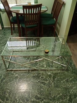 Metal frame glass top coffee table