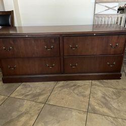 🪑 Large Wooden Dresser / TV Stand – 6 Drawers 💰 $70  📍 Pickup Location: S. Durango & 215 near IKEA  Beautiful long dark wood dresser / storage cons