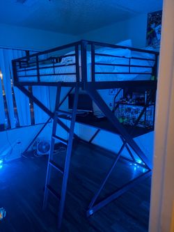 Metal full size loft bed with desk