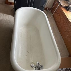 Antique Bathtub And Treadmill 