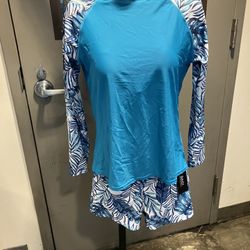 Brand new with tag long sleeve two-piece shorts, swimwear size large