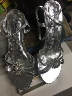 Silver shoes in a size 9 used ones great condition great for the holidays