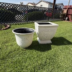 Two. White large pots.