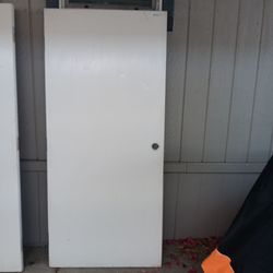 36×79 1/2 puerta exterior laminada por  $70