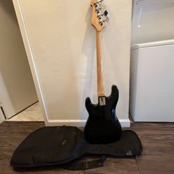 Space, Guitar Amp Case And Cable.