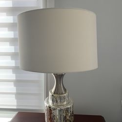 Contemporary home decor ( lamp, medium wall sculpture and two small mirrored sculptured from PIER ONE