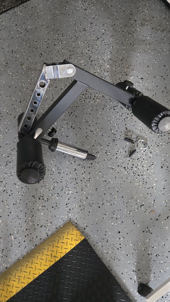 Leg extension for weight bench