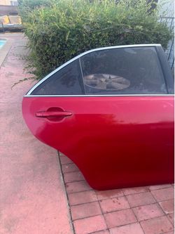 REAR RIGHT PASSENGER SIDE DOOR 2011 TOYOTA CAMRY (RED COLOR).