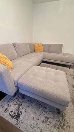 Sectional grey sofa with ottoman