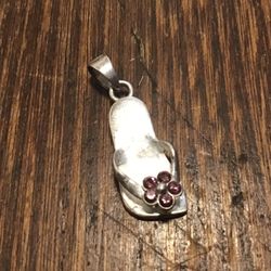 Sterling silver sandal pendant with purple gemstones