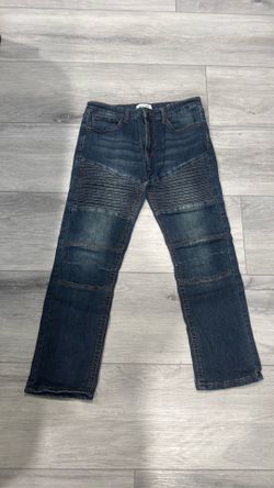 Ring of Fire moto-style jeans featuring ribbed panels above the knees.