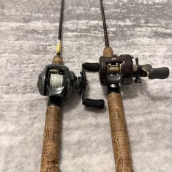 Two bait caster fishing reels