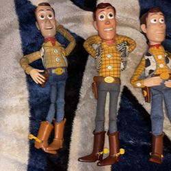 4 Woody dolls 