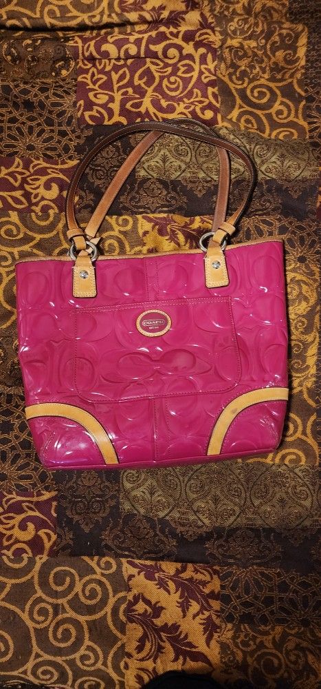 Pink Coach Purse Has Some Flaws