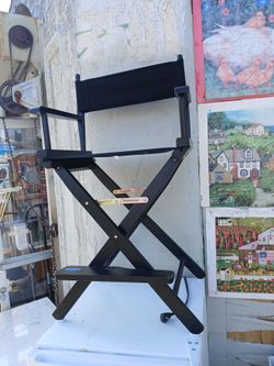 tall black  director's chair