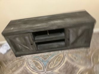 Lockable new washer and dryer and Ashley design signature TV stand