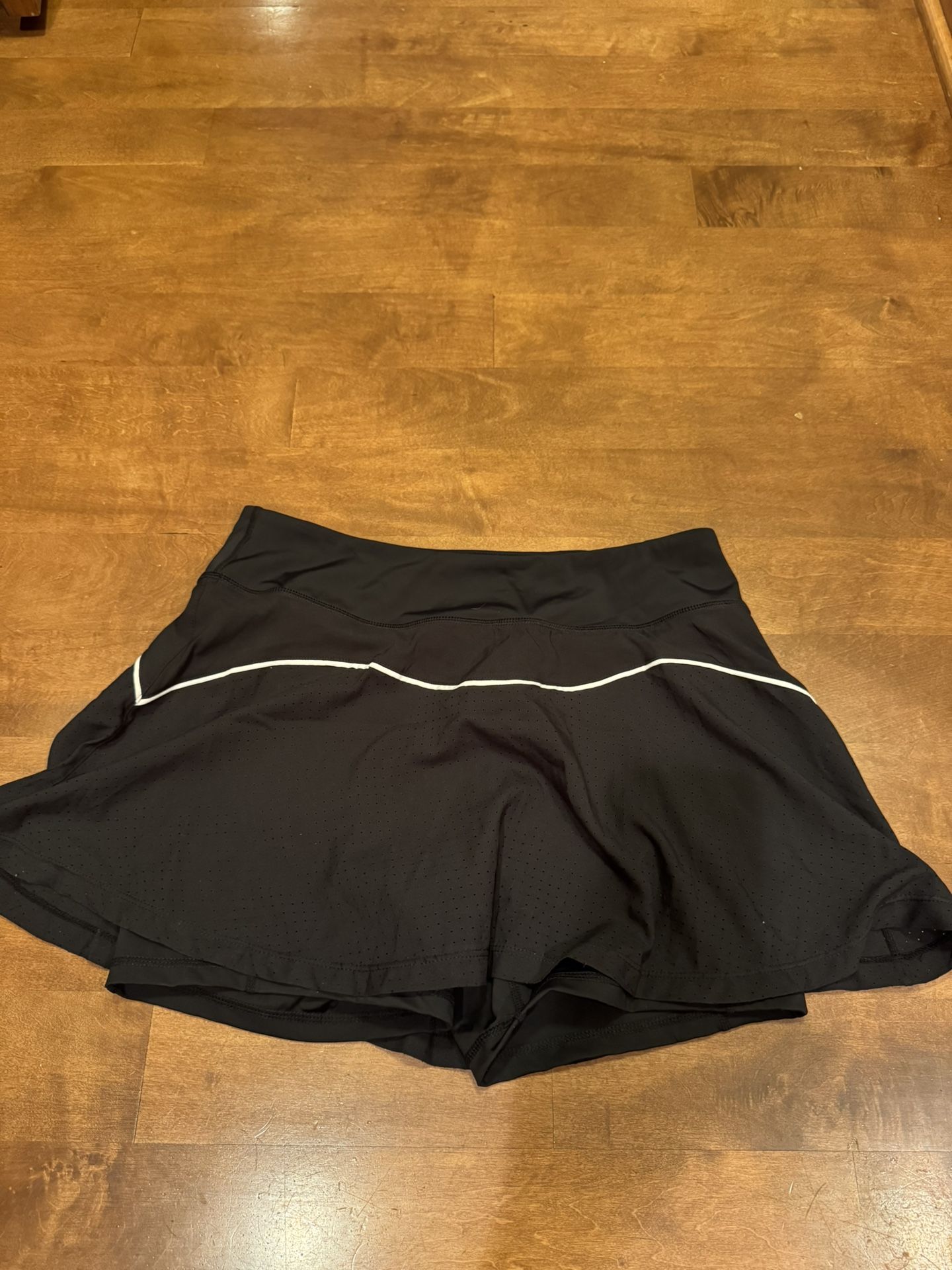 Woman’s new without tags East West Company tennis skirt shipping available