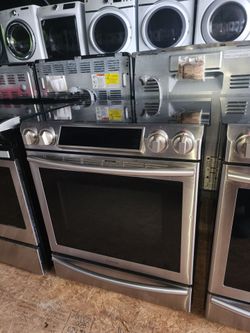 Samsung slide-in glass top stove-- stainless Steel everything works good