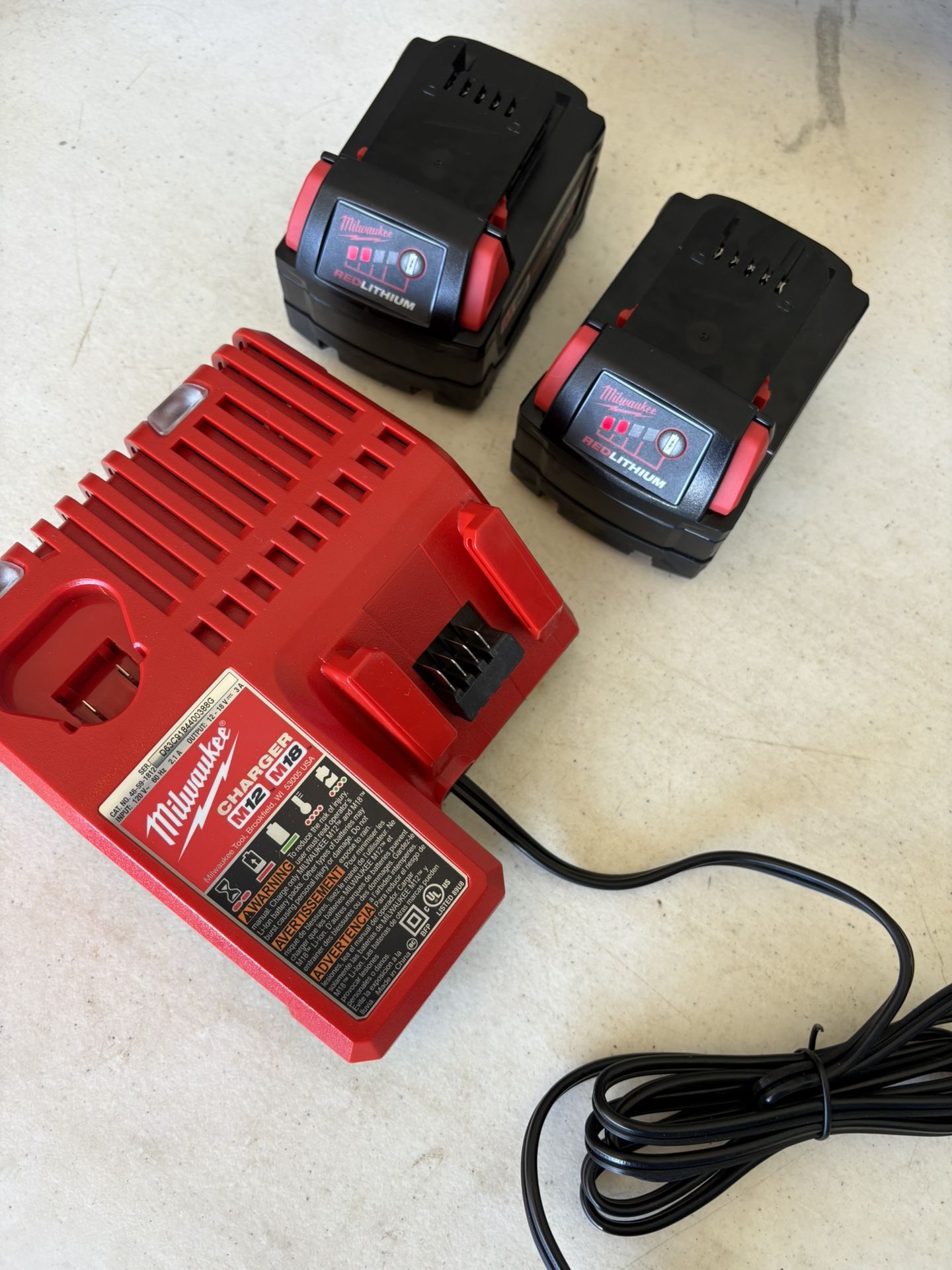 Milwaukee 4.0 Batteries And Charger 