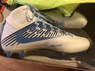 Brand new you Nike shoes in original box with a Nike shoe bag included. White and blue colors. Size 13.