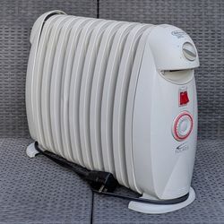 Delonghi Solaris SafeHeat 1500W oil filled 8 fin portable radiator space heater
