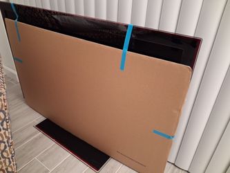 TV 55 inches and table $2.75 obo