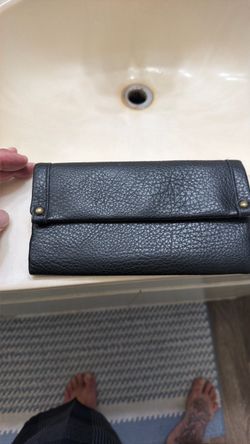 Women’s black leather bag