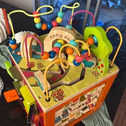 wooden activity cube