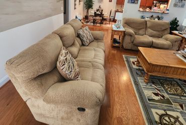 Couch and Loveseat like new Reclining on both ends...tan in color..non smoking/no pets