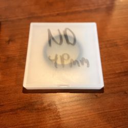 Three 49mm lens filters