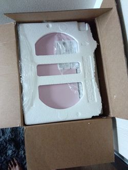 Brand new pink microwave in the box