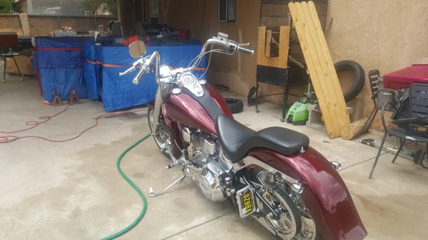 1997 softail runs great looking to make a trade for a bass tracker nice lake ready boat