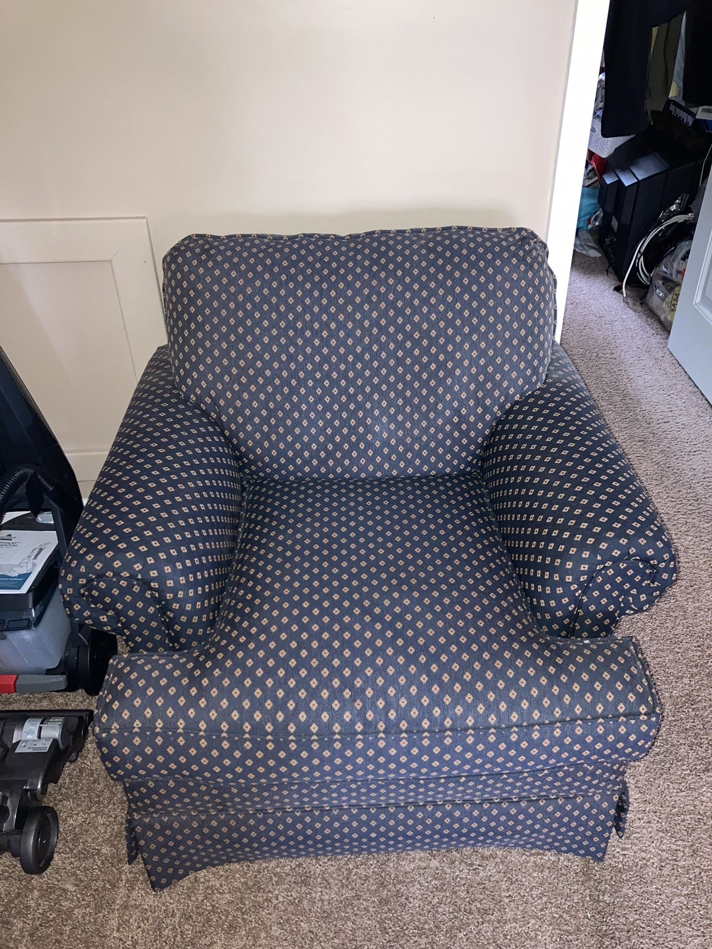 Beautiful Blue Cushioned Chair.