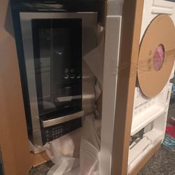 Over the range microwave oven