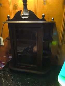Brown Wood curio cabinet