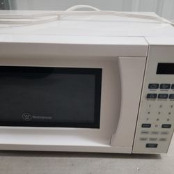 Working White Microwave 