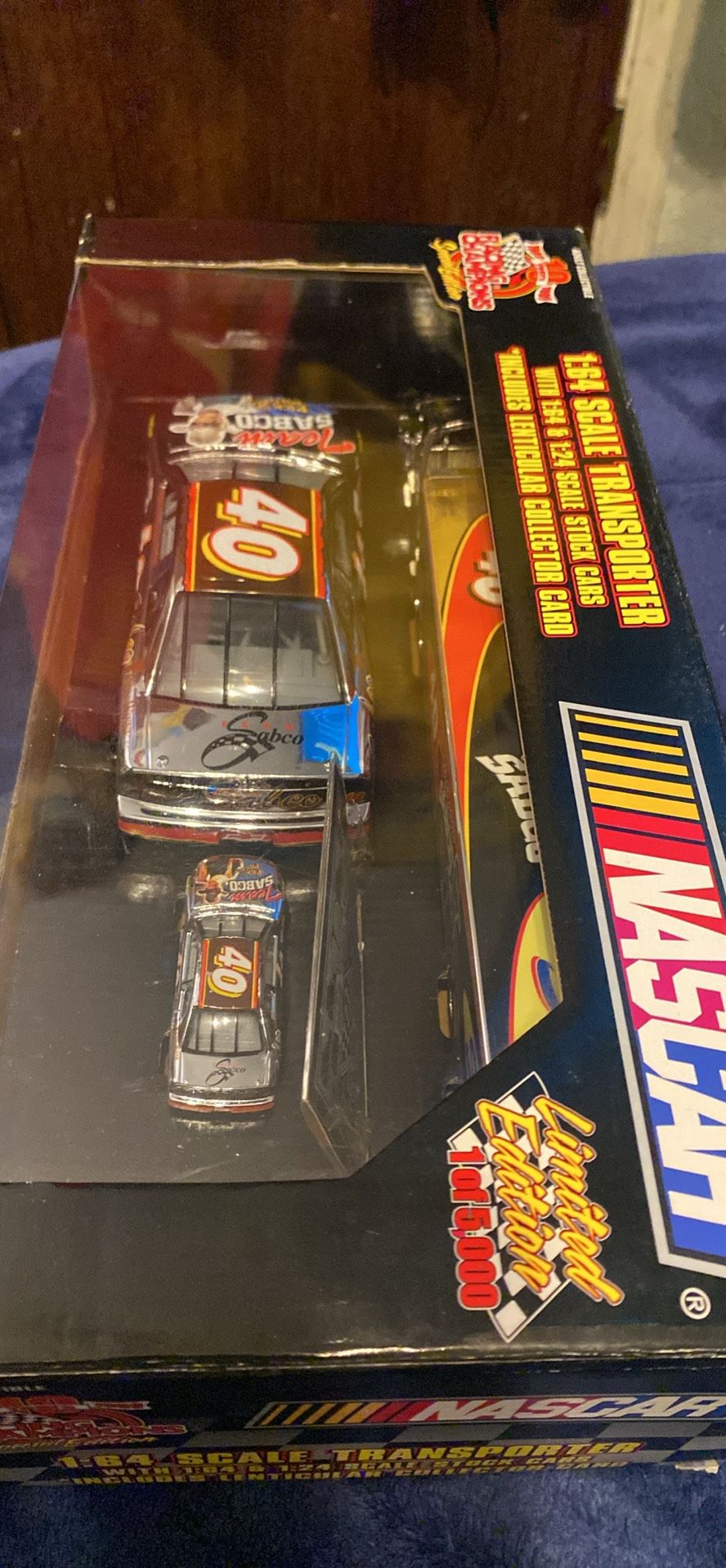 1:64 scale transporter with 1:24 & 164 scale stock cars & collector card