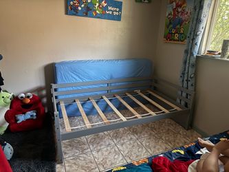 $25 **frame only**  Twin bed with extra  roll out twin under.