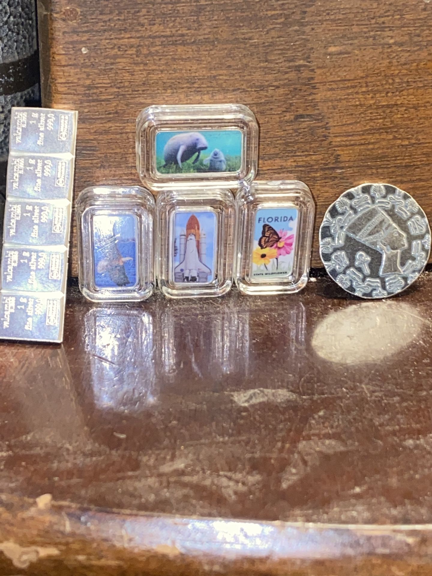 Four individual colorized silver 1 g 5/1g silver bars 1/4 ounce silver Egyptian
