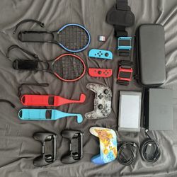 Nintendo Switch with Nintendo Sports Game, 2 Controllers, and sports accessories