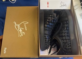 These appear to be Christian Louboutin Seavaste 2 Orlato sneakers