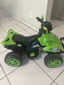 Kids ride on quad