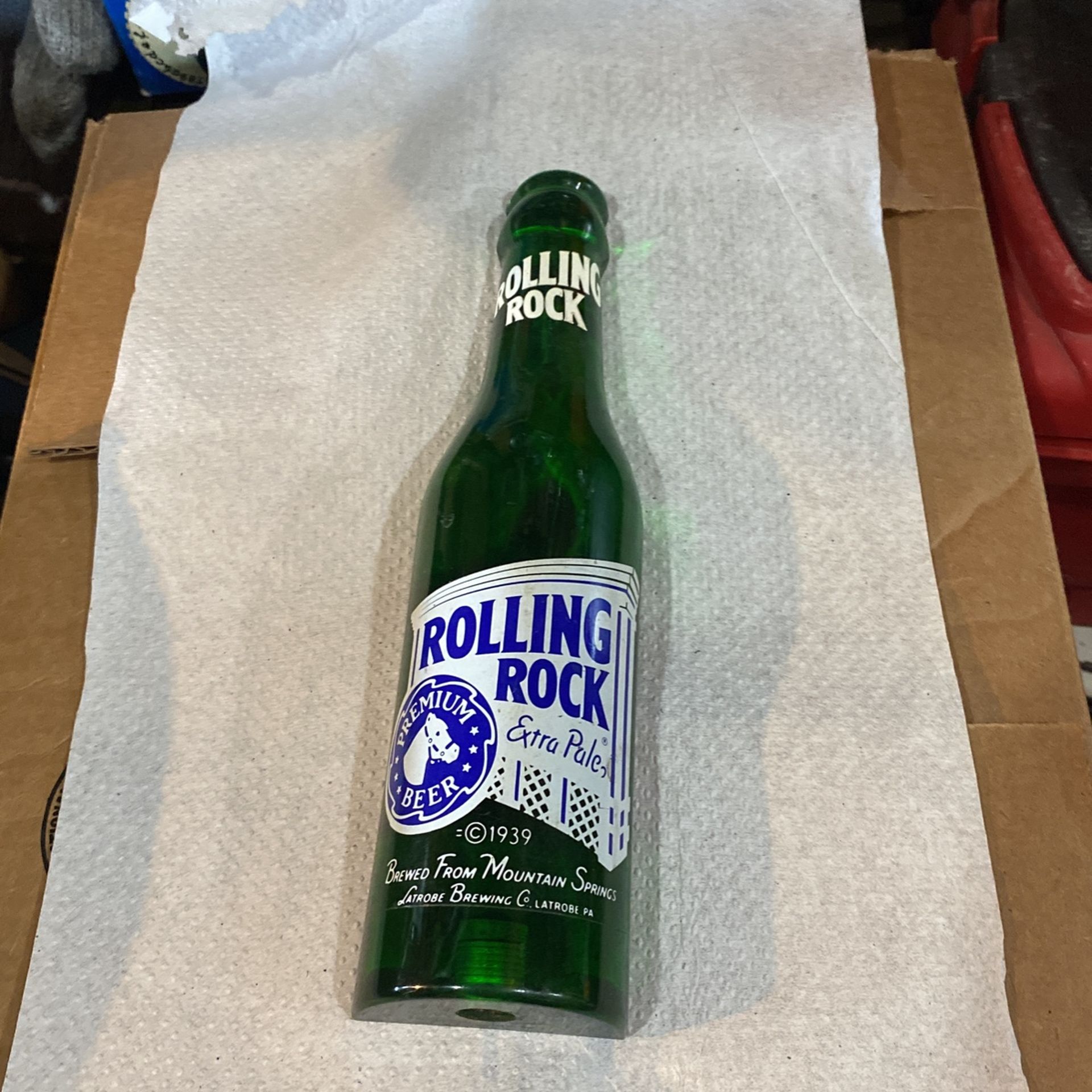 A tap handle for rolling rock