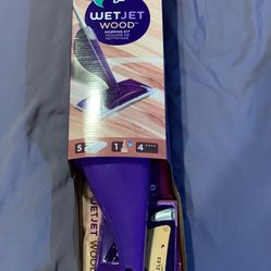 New Swiffer Wet Jet Wood Mopping Kit.  New and sealed 