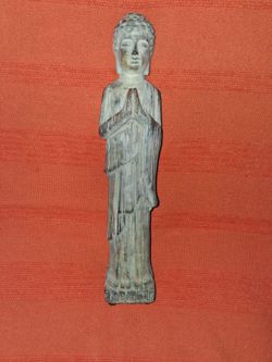 Buddha lady, 3 inches by fifteen inches