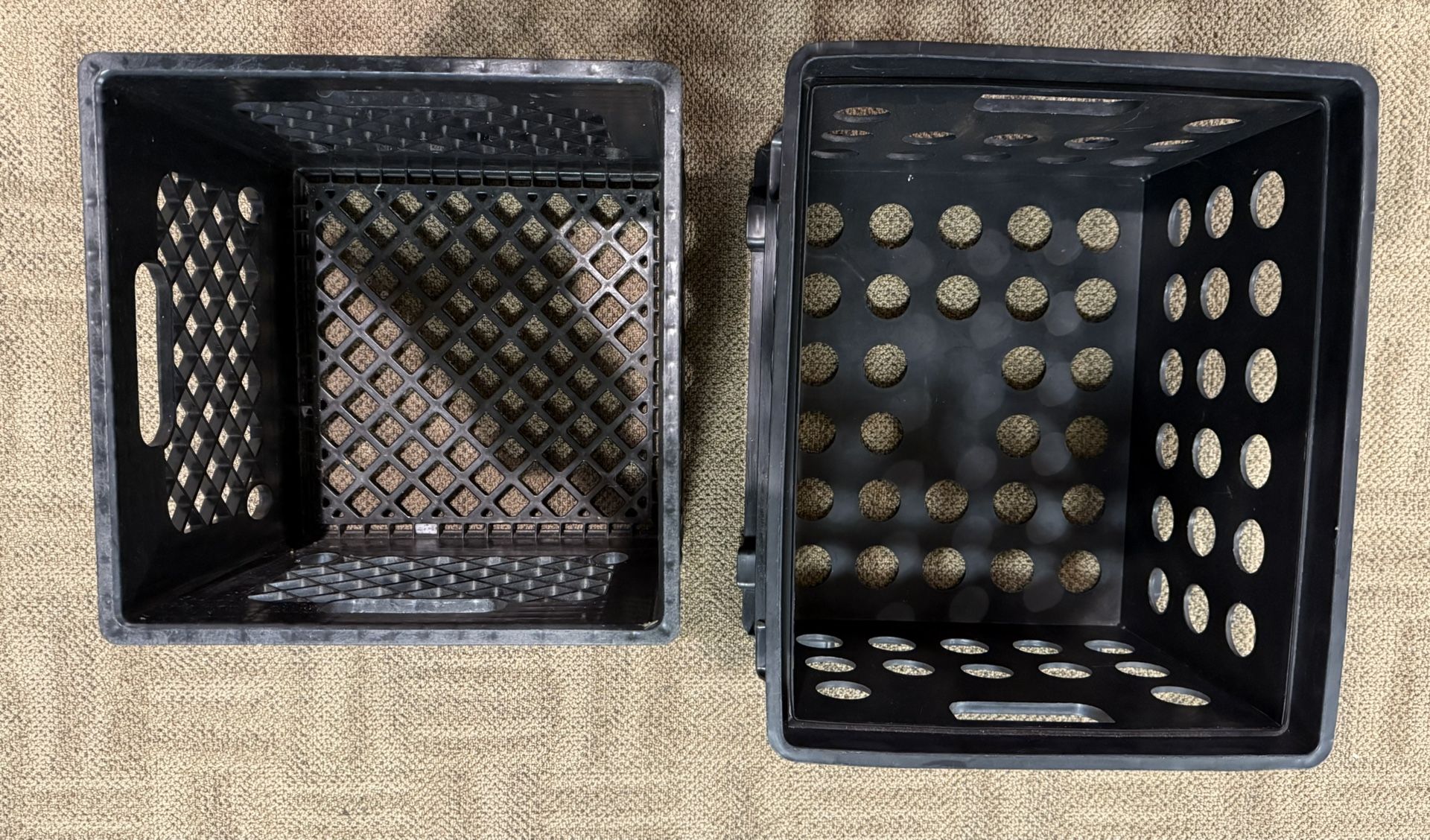 Two plastic storage crates with handles (Sterilite and Dean Foods).