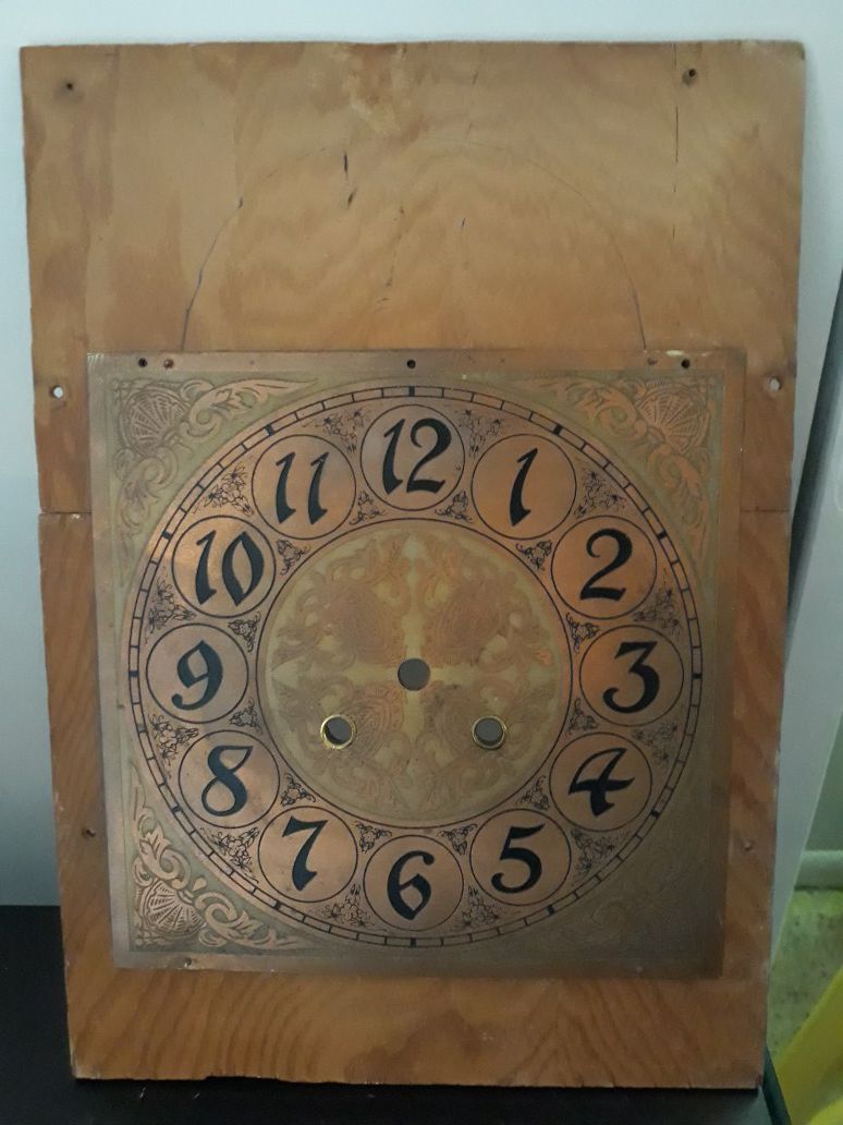 Old clock backing from a grandfather clock